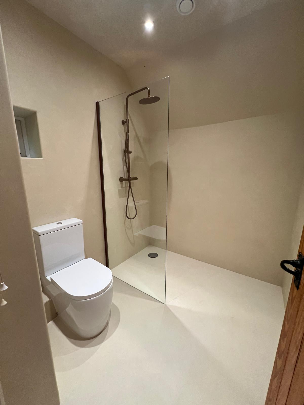 Completed microcement wetroom by Pulse Bathroom